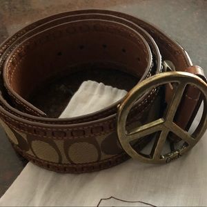 Coach belt with peace sign buckle